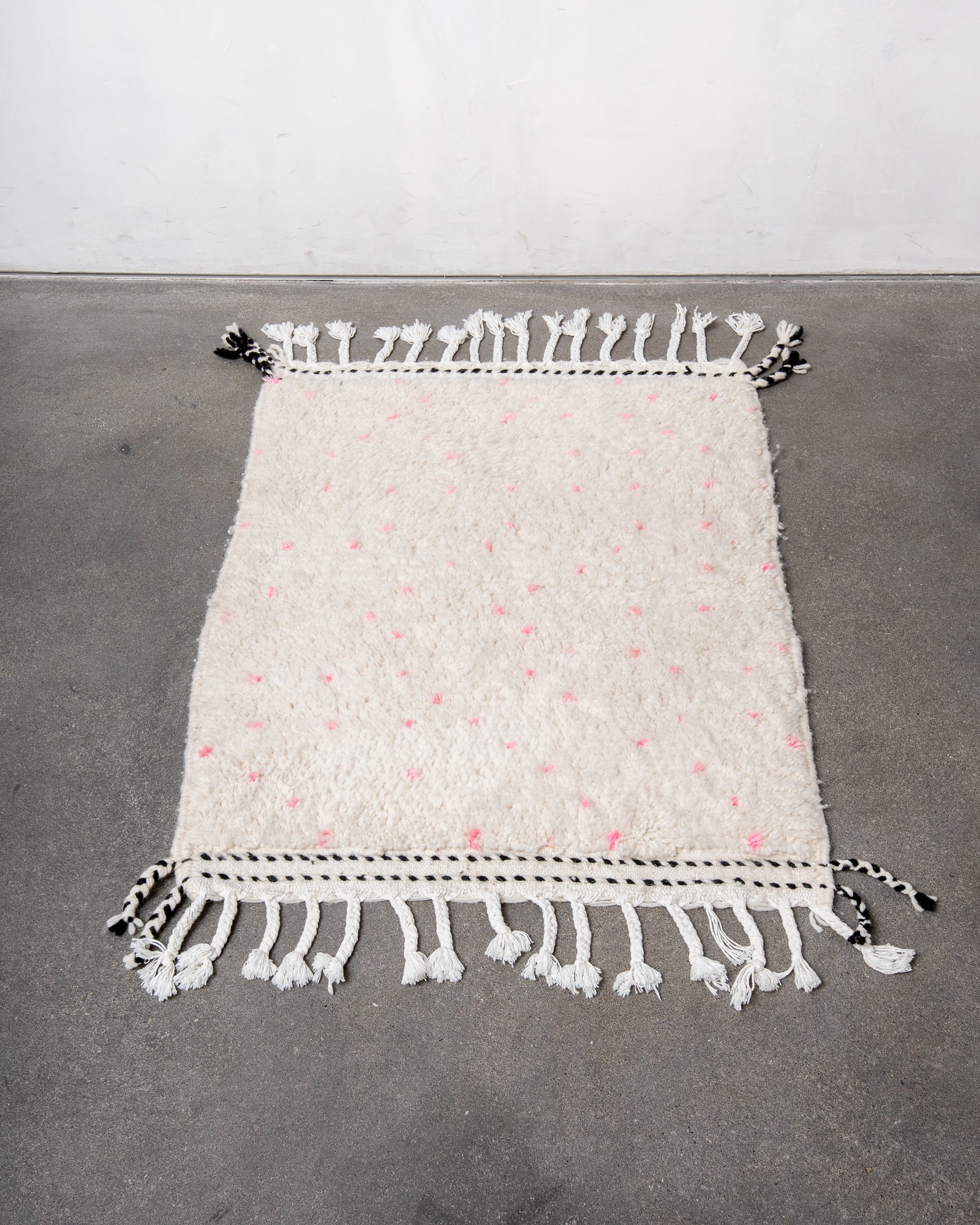 Modern, designer, handcrafted Berber rug from Morocco. Beniourain carpet with beautiful colours and patterns and fluffy wool texture.